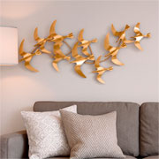 Adorno de parede em metal pássaros dourado 45X106 cm. 